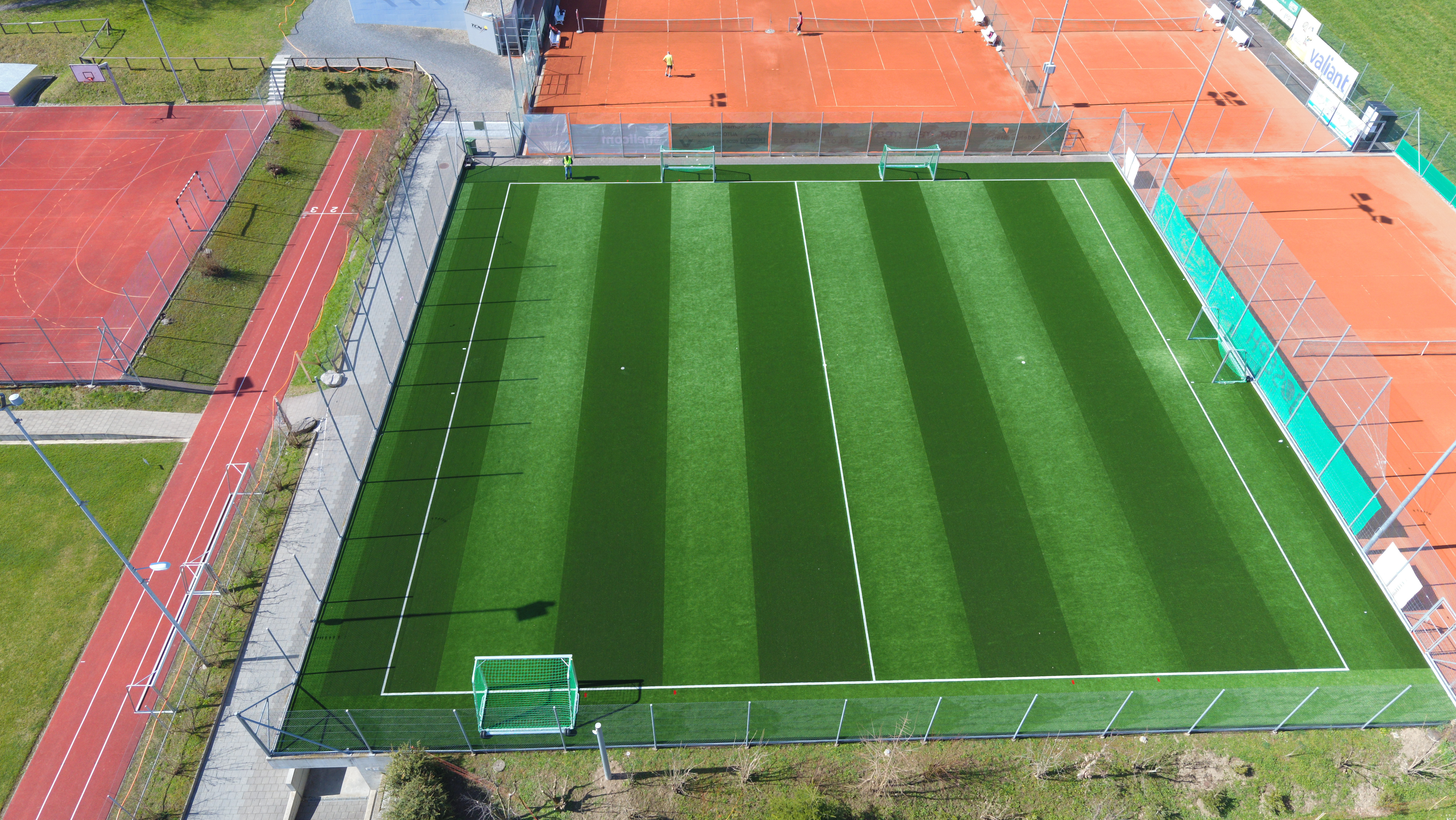 Projektbild: Kunstrasensystem Schulhaus Grünau Neuenkirch